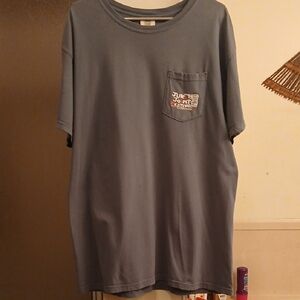 "Juke JOINT festival,Clarksdale, MS." Comfort Colors Slate Blue Pocket Tee. (L.)